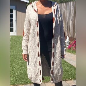 Knit sweater with hood